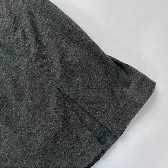 free-people-movement muscle mesh back panel hem slits tank-top
