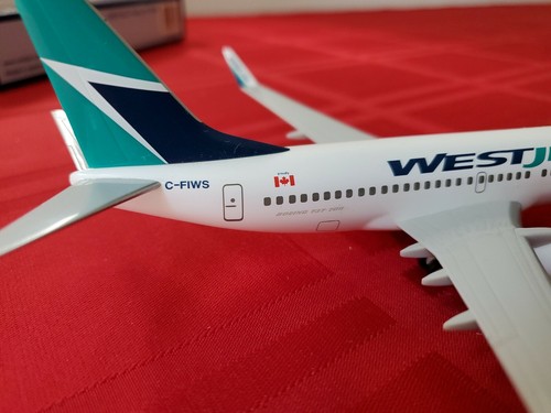 Hogan Wings Westjet C-Fiws 737-700W 1/200 mit Getriebe mit Box mit Ständer - Bild 8 von 12