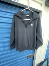 Adidas ALL SZN Fleece Quarter-Zip Sweatshirt in black. Mens Size Medium