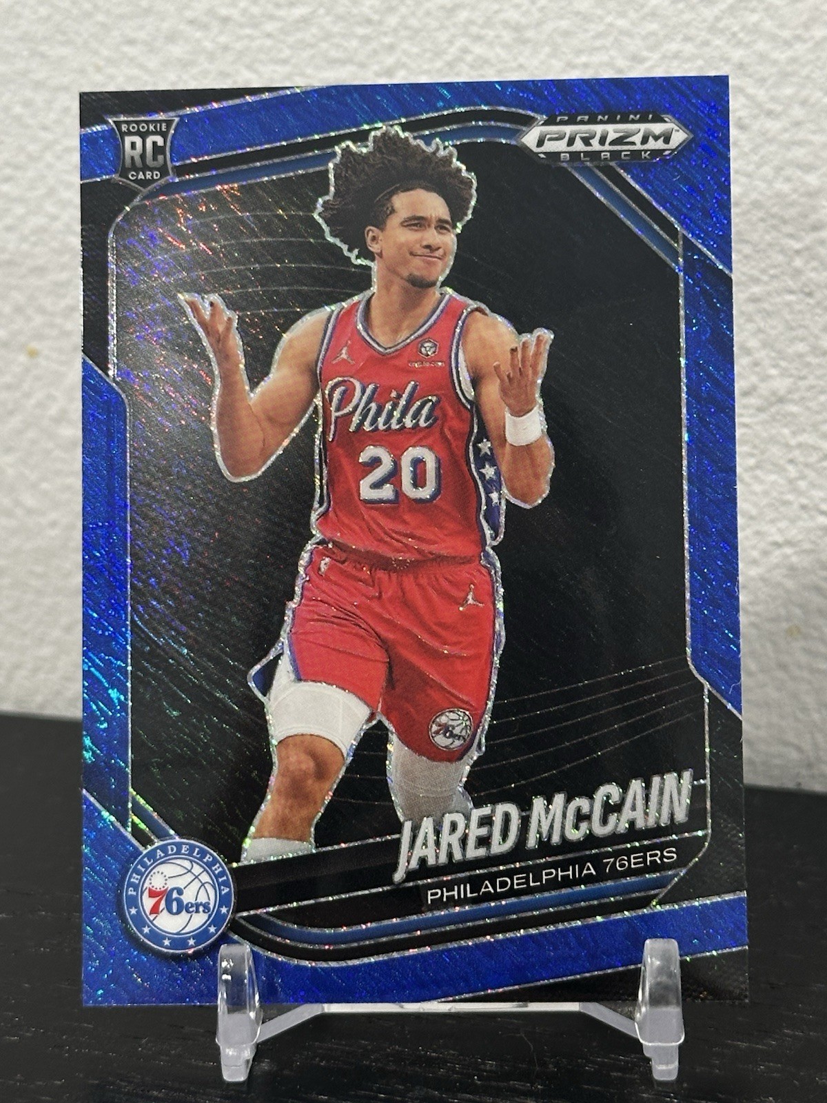 2024-25 Panini Prizm Black FOTL Jared McCain Blue Shimmer (RC) /35 #80