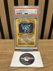 PSA 7 Machamp & PSA 6 Chansey Base Set Pokemon Card
