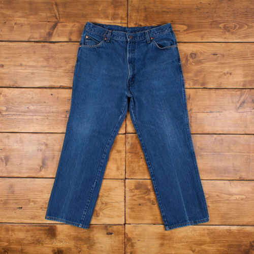 Vintage Levis 557 Jeans 34 x 27 Rivets USA Made 80s Dark Wash Bootcut Blue