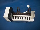 Used Oem Icemaker Genuine Ge Wr30X0318 Ice maker / makes 8 radius cubes