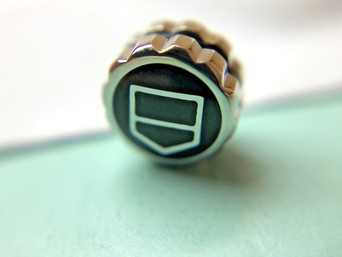 TAG HEUER FACTORY STAHLKRONE MIT EMAILLE LOGO & KAUTSCHUK RING 7,5X4,7MM #05 - Bild 1 von 4