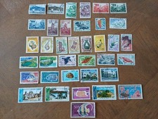 37 timbres Comores Oblitérés entre 1 et 121 Poissons Oiseaux Paysages Cote +115€