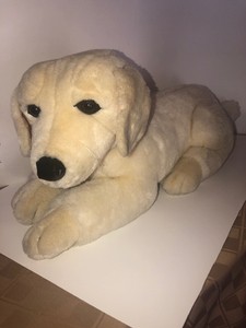 large stuffed yellow lab