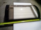 vitre de poele a bois courbé de 56cm 40cm de large hauteur au plus  haut 10.5cm