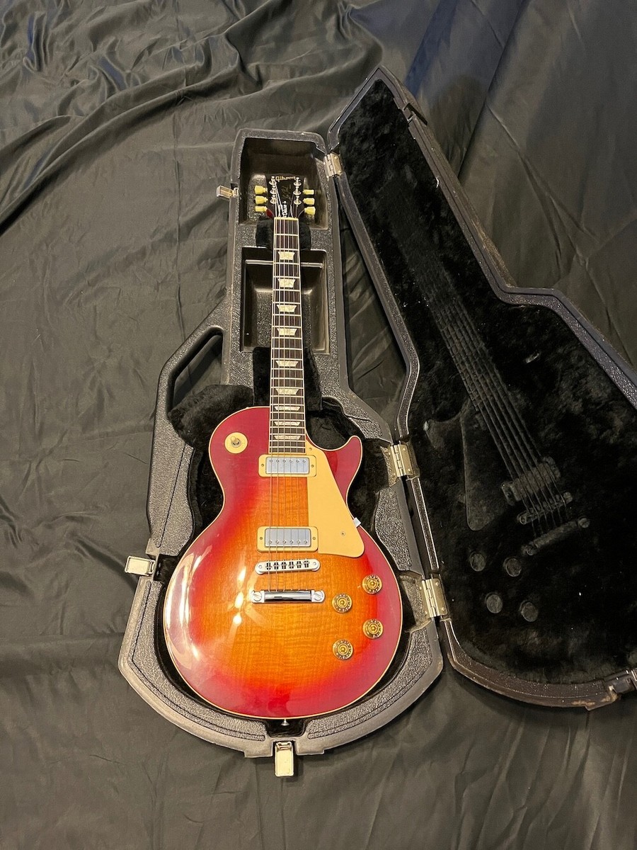 1985 Gibson Les Paul Deluxe in Cherry Sunburst W/Chainsaw