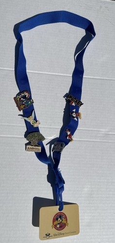 Disney Pin Trading Lanyard With 7 Vintage Pins and Tag