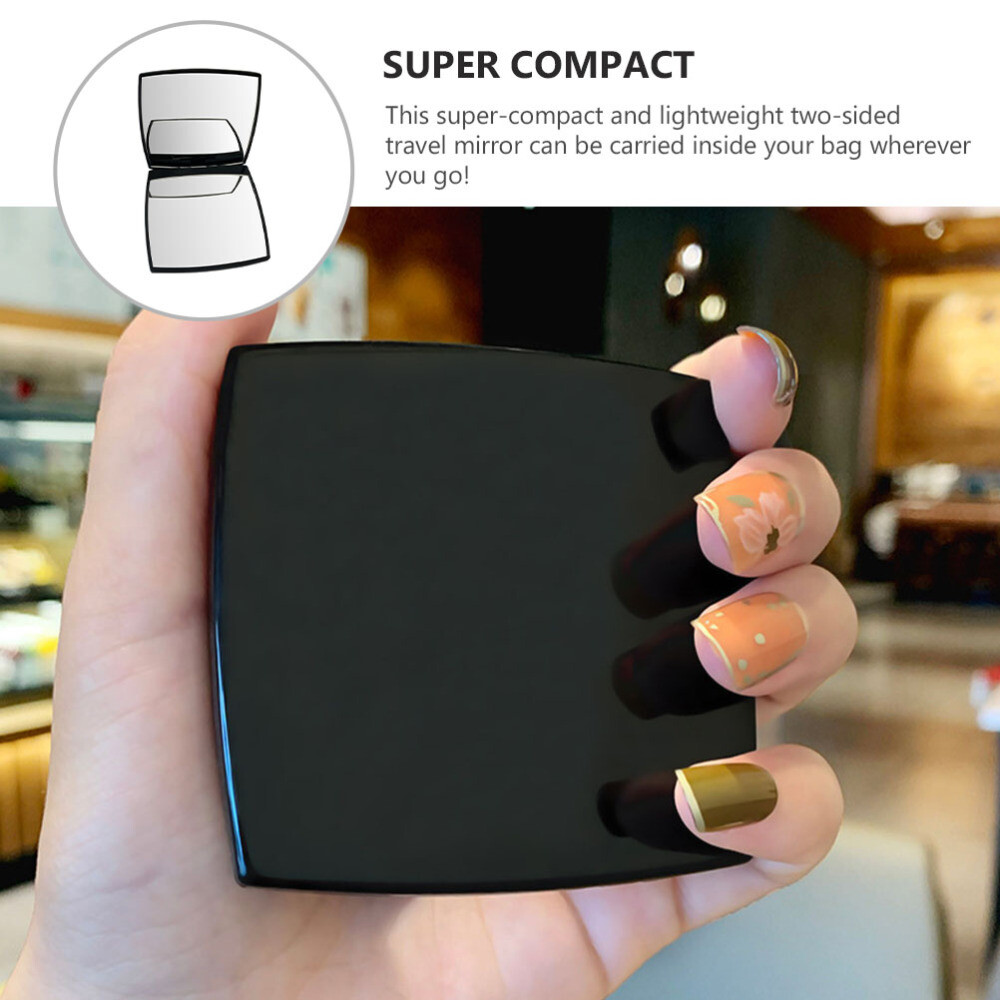 Two sided online makeup mirror