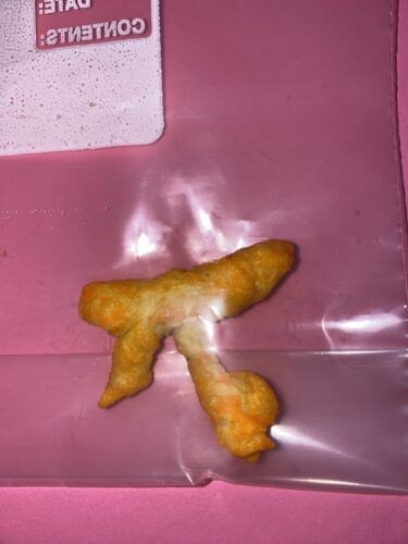 Cheeto Shape Like Gun Or The Eye Of Horus And Ra? 🧐🤔 - Picture 2 of 4
