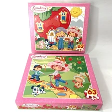 Lot Two Strawberry Shortcake Puzzles Berry Fun and Life is Delicious 63 Pieces