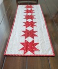 Handmade quilted table runner/red/stars