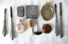 11 EARLY 20TH CENTURY SHOWCASE OBJECTS