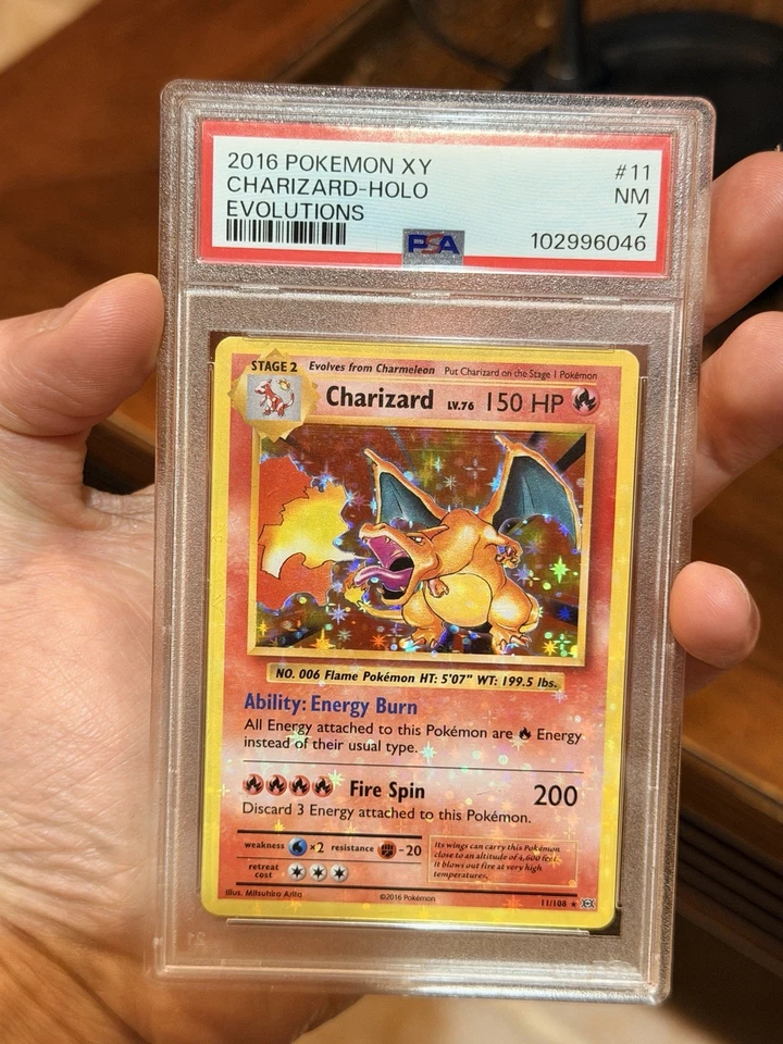 Charizard 11/108 HEAVY HOLO BLEED 🩸 PSA 7 Error Pokémon XY Evolutions - Image 3 of 4