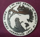 Alice meets the Cheshire cat. Silhouette wall plaque. 250mm diameter.
