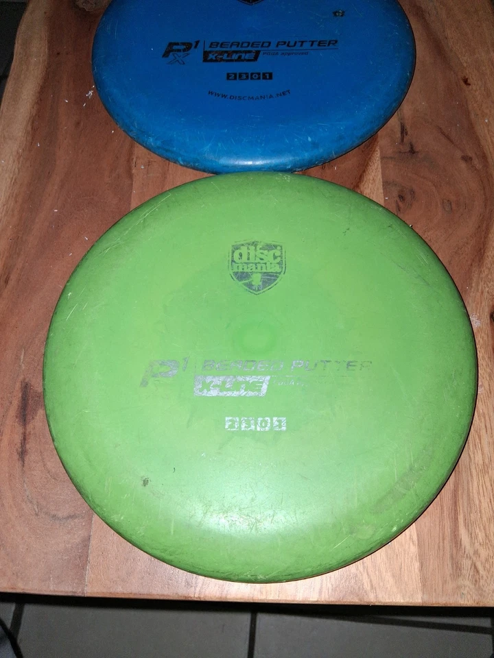 Dos putters con cuentas Dismania P1X X-line. Innova Run. Foto 2 de 4