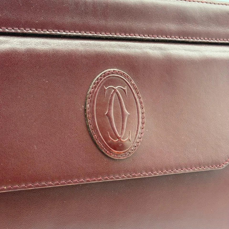 Bolso clutch Cartier Must Line de cuero en buen estado herrajes dorados logotipo mzmr A Foto 4 de 4