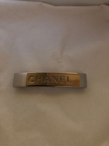 gold chanel hair clips