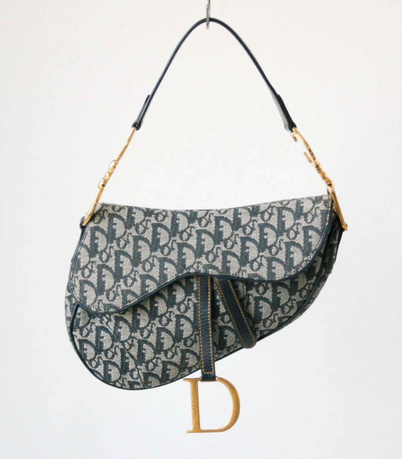 Sac à main toile oblique ton or sacoche selle trotteur Christain Dior