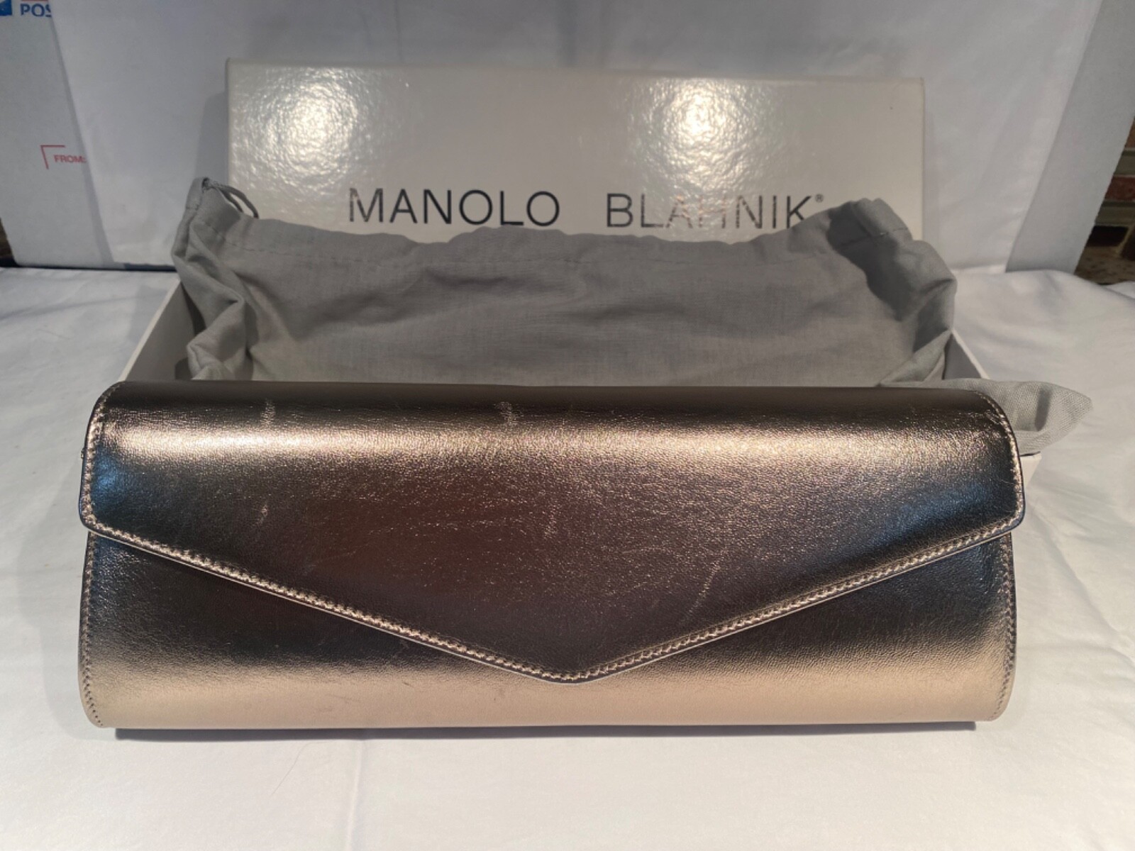 manolo blahnik metallic silver clutch purse with chain strap