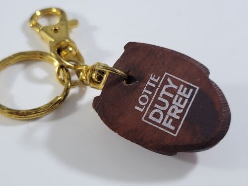 Schlüsselanhänger Schlüsselring asiatisches Holz Gesicht Lotte zollfrei Werbung goldfarben - Bild 6 von 6