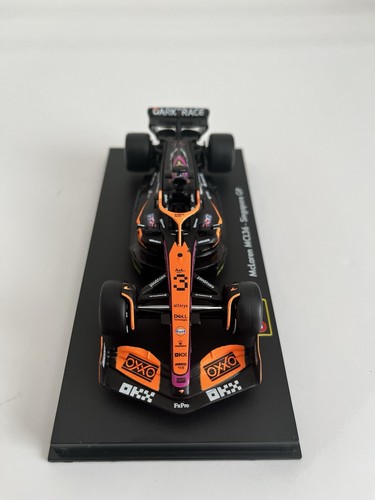 Bburago 1:43 Formula1 McLaren Racing MCL36 2022 Daniel Ricciardo #3 Singapore GP - Imagen 12 de 24