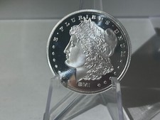 1 oz. Morgan Silver Round .999 fine Proof like 45.00 per troy oz