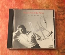 GFA Smallworld and & the News  * HUEY LEWIS *  Signed CD Booklet JL1 COA