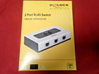 DeLock 87673 2fach Umschalter RJ45, Gigabit, manuell, bidirektional