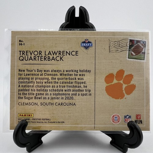 2021 Panini Prestige - Seasons Greetings #SG-1 Trevor Lawrence (RC) - Picture 2 of 2