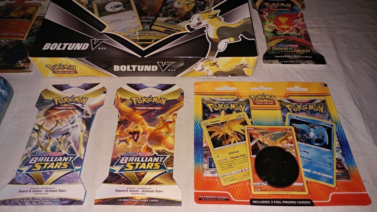 boltund v box booster packs Pokemon VBox w/ Evolving Skies - Mini Tins 2 and 3 Pack Blisters + this quick Pokemon has the speed you need to unleash electrifying combos in your next Pokemon TCG match Pokemon Boltund V Box New