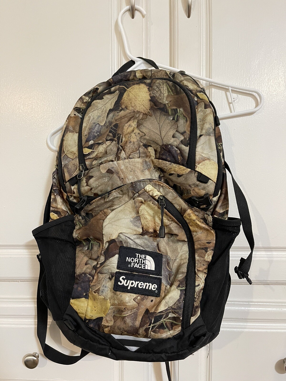supreme north face camo backpack