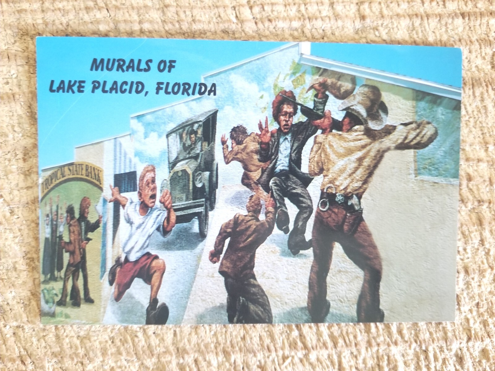 MURALS OF LAKE PLACID FLORIDA.TROPICAL BANK ROBBERY.UNUSED POSTCARD*C23