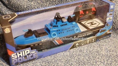 2.4G 8CH RC Police Pursuit Ship 15KM/H CANNONE AD ACQUA FUNZIONANTE e barca attacco mimetico - Foto 14 di 32