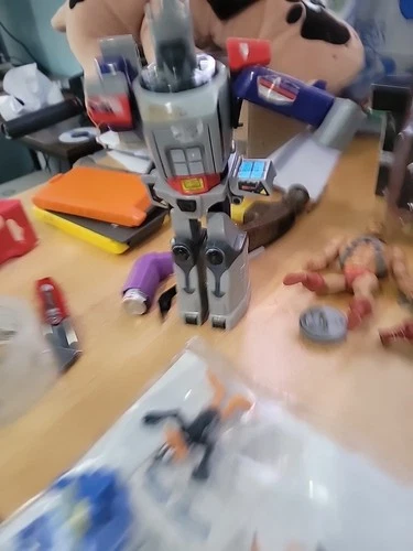 Random toy lot Includes galvatron g1  figures of pound puppy missing its nose