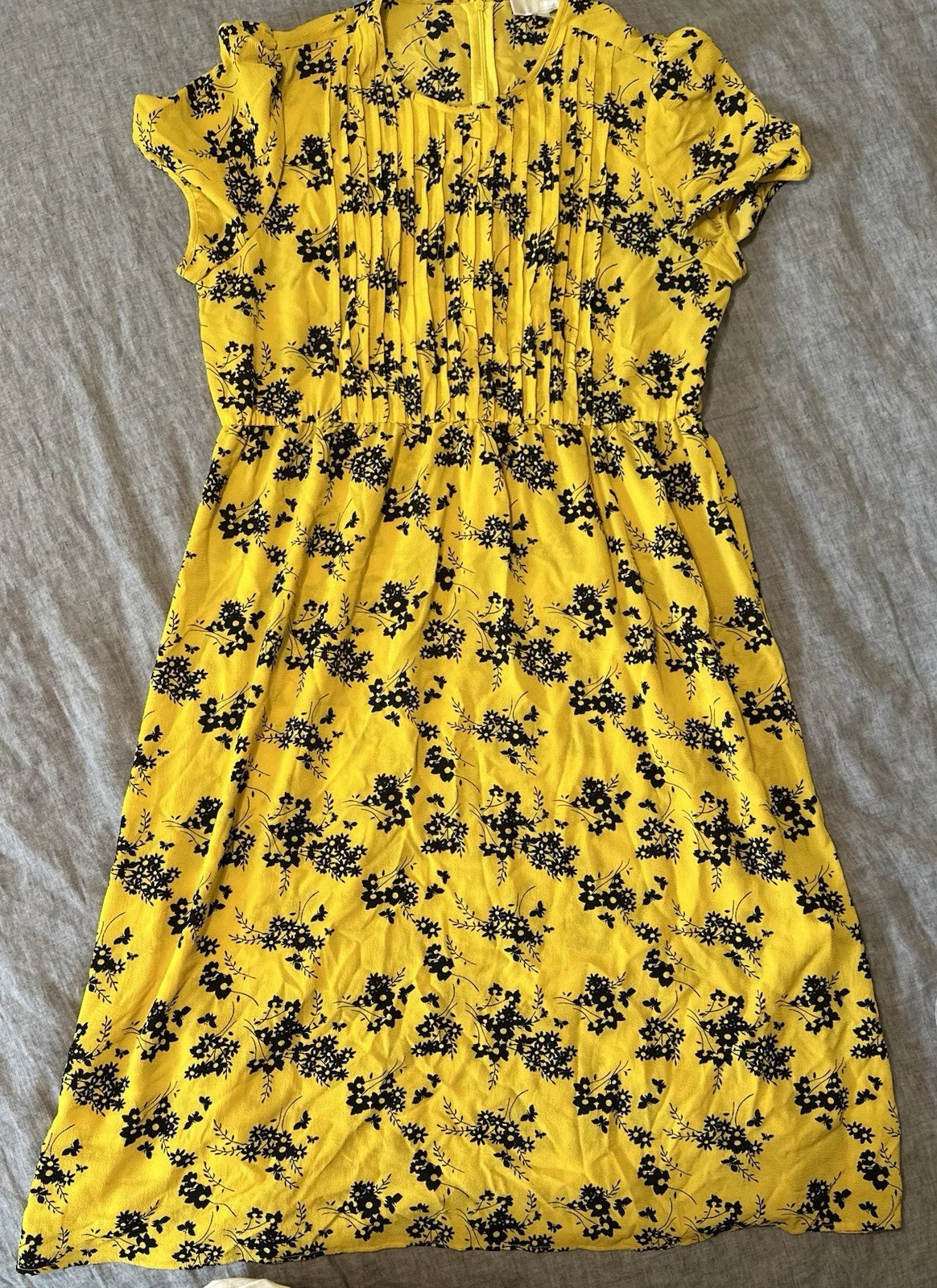 Abito Michael Kors aderente e svasato nero giallo stampa botanica crepe donna plissettato L