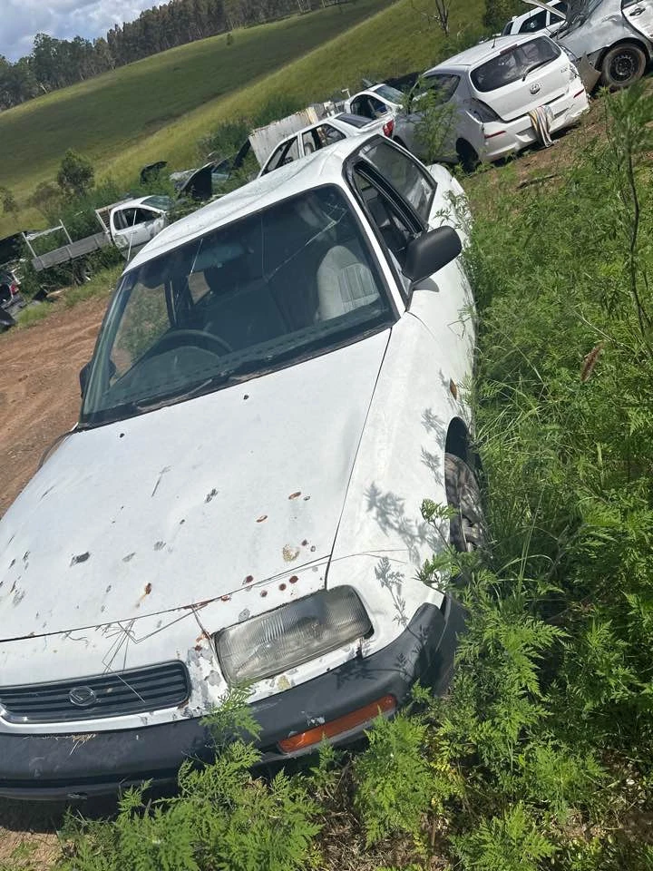 1992 Daihatsu Applause A101 Left Front Door Lock 89-97 OEM Replacement #B529 - image 3 of 4