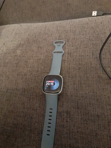Fitbit Versa 4 23mm Silver Case with Waterfall Blue Silicone Band (FB523SRAG) - Picture 1 of 3