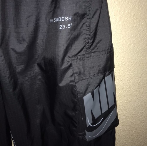 Nike Swoosh Windbreaker Sportswear Trainingshose Damen Medium schwarz neu ohne Etikett - Bild 4 von 8