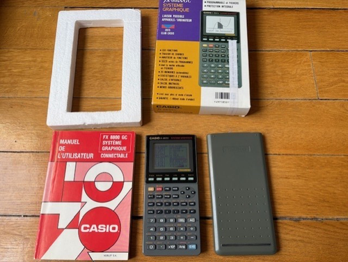 Casio FX-8800G , graphic scientific calculator file editor with box manual.