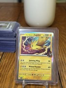 Pocket Scout - Pokémon TCG Team Rocket's Zapdos Destined Rivals Holo