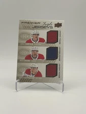 2024-25 Premier Triple Jersey Caufield Suzuki Slafkovsky #PT-CSS /49