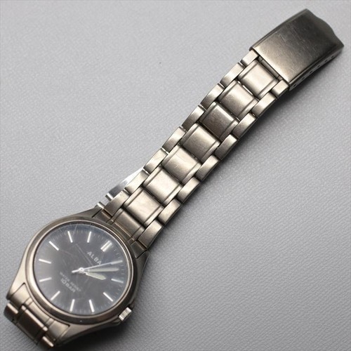 SEIKO ALBA V501-0B00 titanio resistente all'acqua 10 bar quadrante nero roton... - Foto 6 di 8