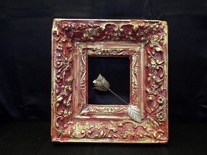 Pewter-Rose-in-Antique-Rococo-Dark-Red-and-Gilded-Plaster-Frame-on-Wood