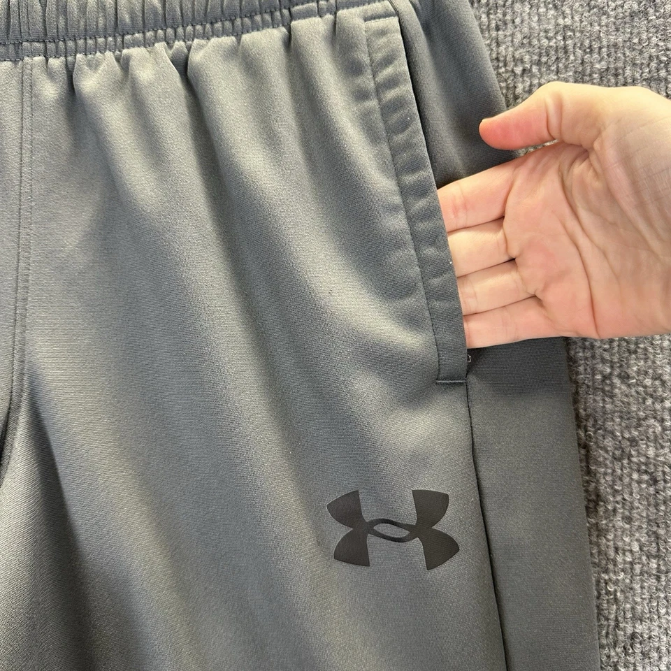 Pantalones deportivos Under Armour para jóvenes niños grandes grises sueltos Foto 2 de 4