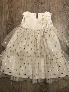 white dress with gold polka dots