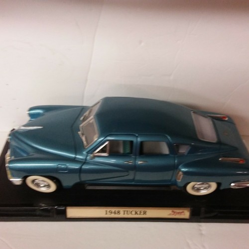 1948 TUCKER TORPEDO 1/18 Diecast Car by Road Signature Blue on display - Picture 10 of 10