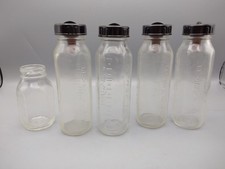 Vintage Collectors Glass Evenflo Layette Package of 4  1 small Bottles Nipples