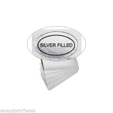 500 Peel Off Adhesive LABELS tags ~ Oval 1/2" x 5/16"  Marked "Silver Filled"